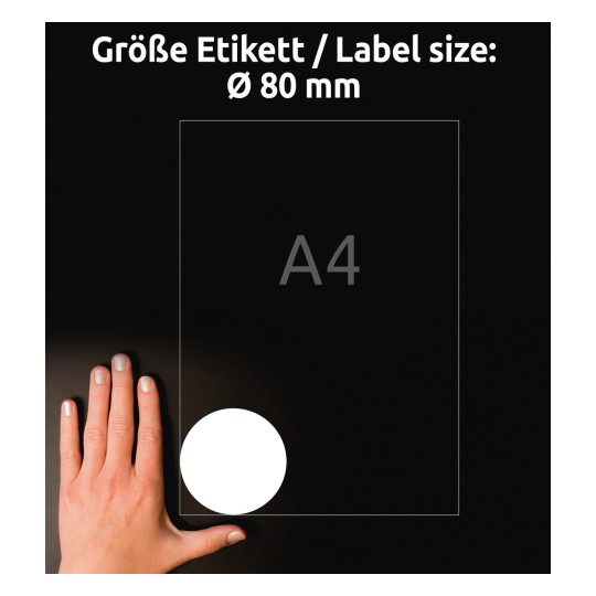 Kuvassa on käsi A4-paperin vieressä, jossa on pyöreän etiketin kokomerkintä Ø 80 mm tummalla taustalla.