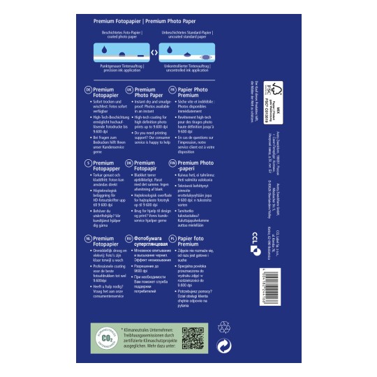 Kuva esittää premium-valokuvapaperin pakkauksen, jossa kerrotaan sen ominaisuuksista ja eduista useilla kielillä. Siinä korostetaan välitöntä kuivumista, korkearesoluutioista tulostuskykyä ja asiakastukitietoja.