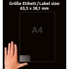 Kuva näyttää käden etiketin vieressä, jonka mitat ovat 63,5 x 38,1 mm, mikä osoittaa, että se on A4-kokoinen etiketti.