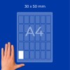 Käsi A4-arkin vieressä; kaavio, jossa lukee 30 x 50 mm ja jossa on pieniä suorakulmaisia soluja?